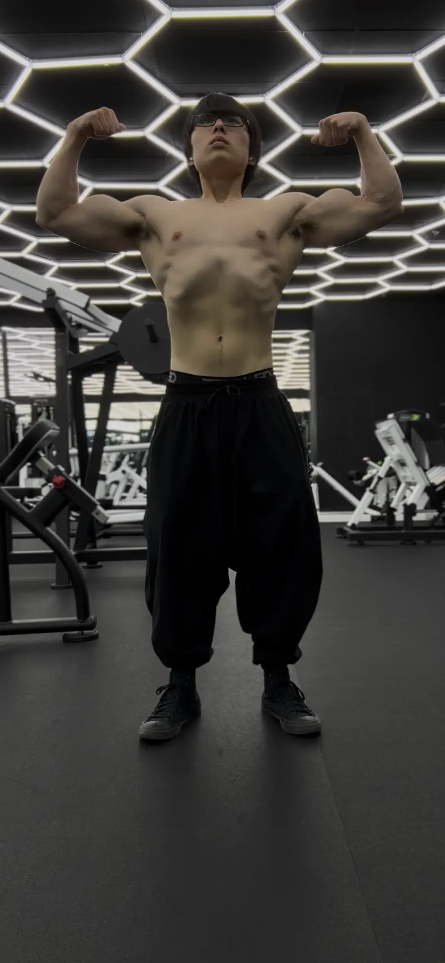 Ying, lean and muscular after two years of training
